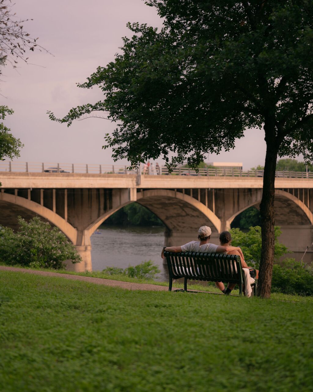 Couple sitting by the lake in Austin, Texas